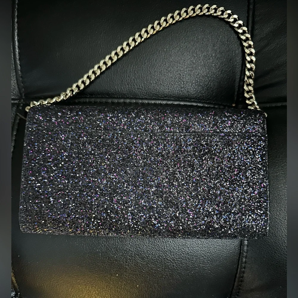 kate spade New York black w/multi colored glitter Milou Sunset Lane clutch.